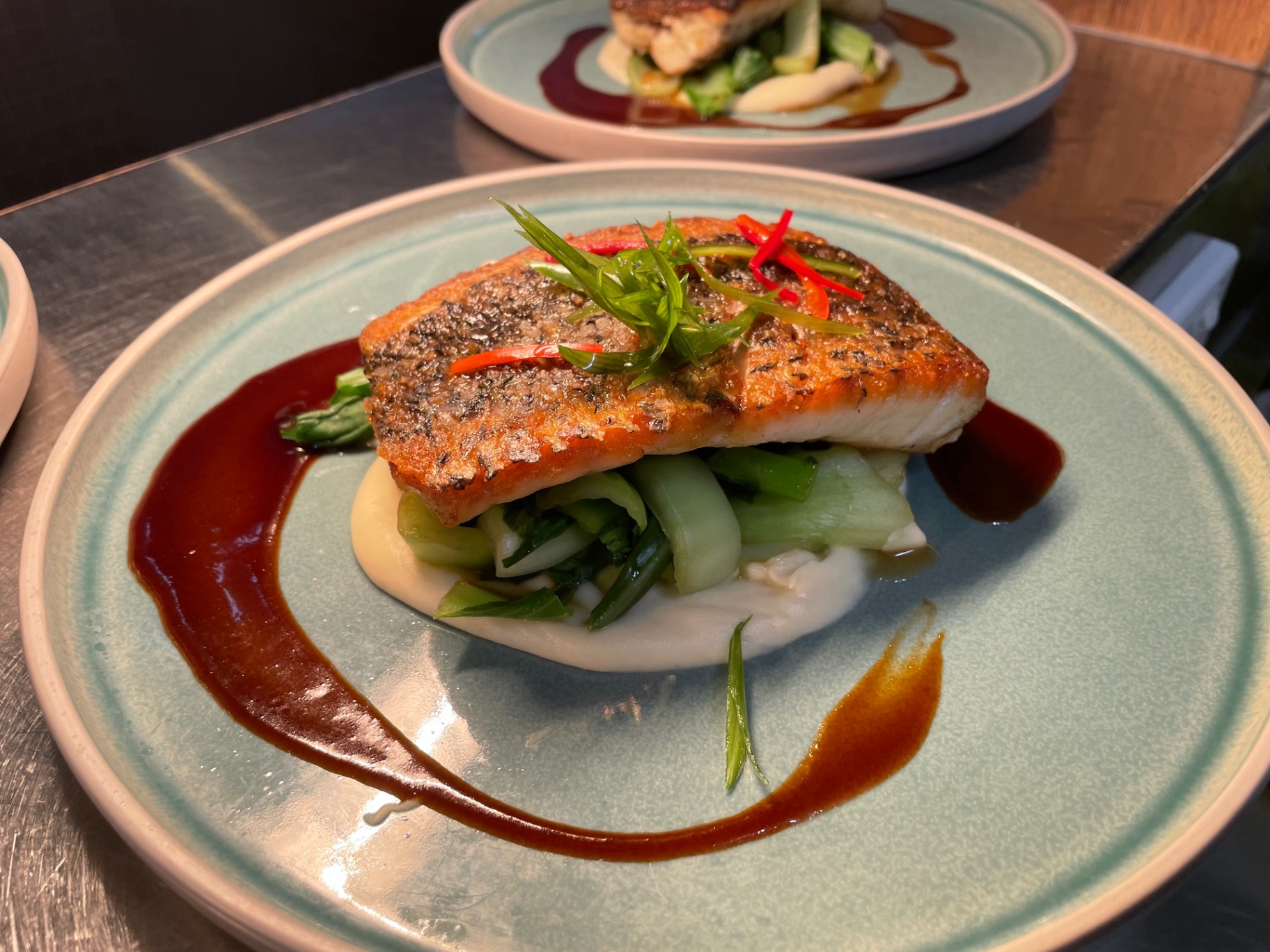 Crispy skin barramundi, cauliflower purée, bok choy