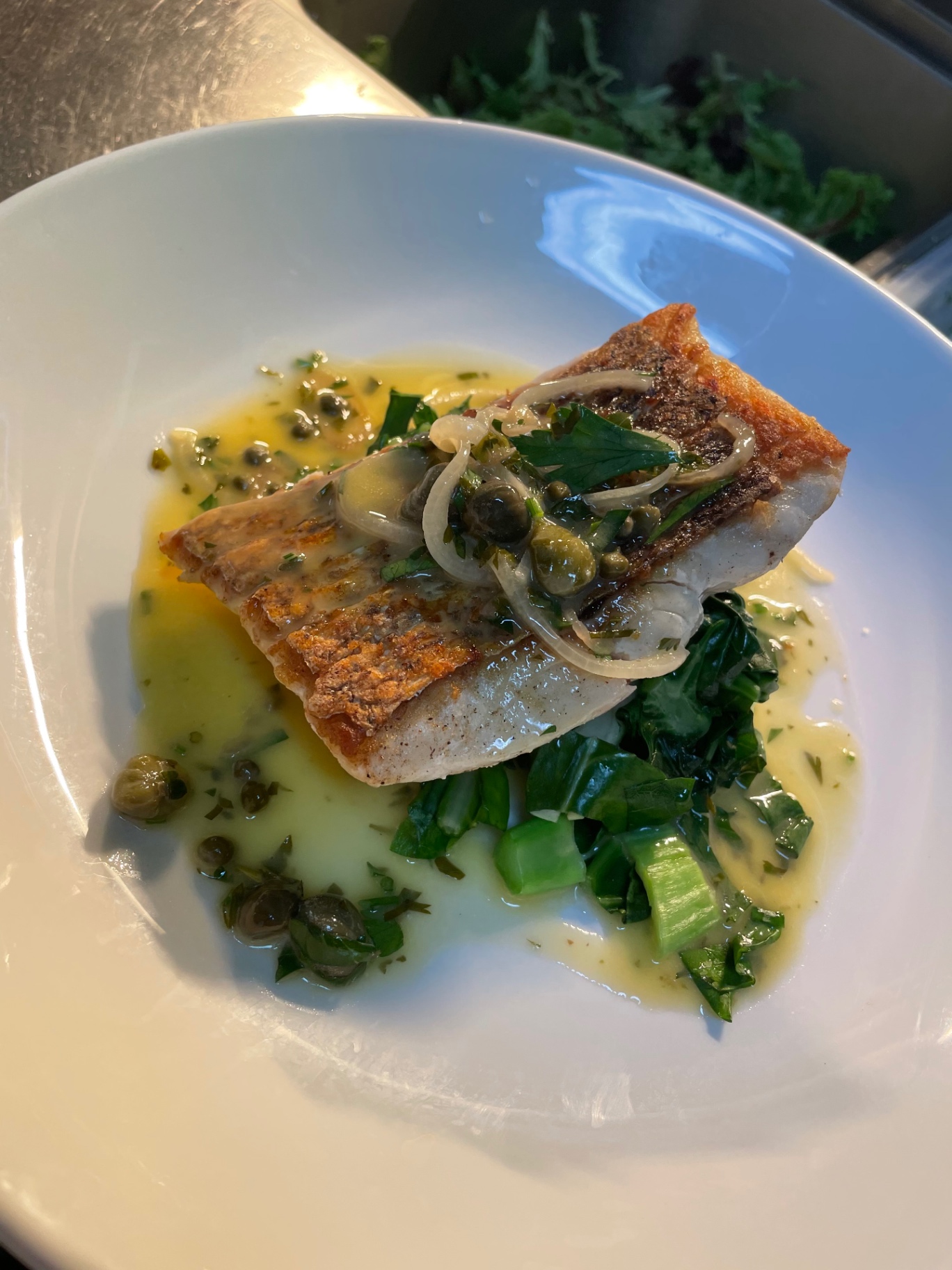 Snapper, brown butter capers, wilted greens