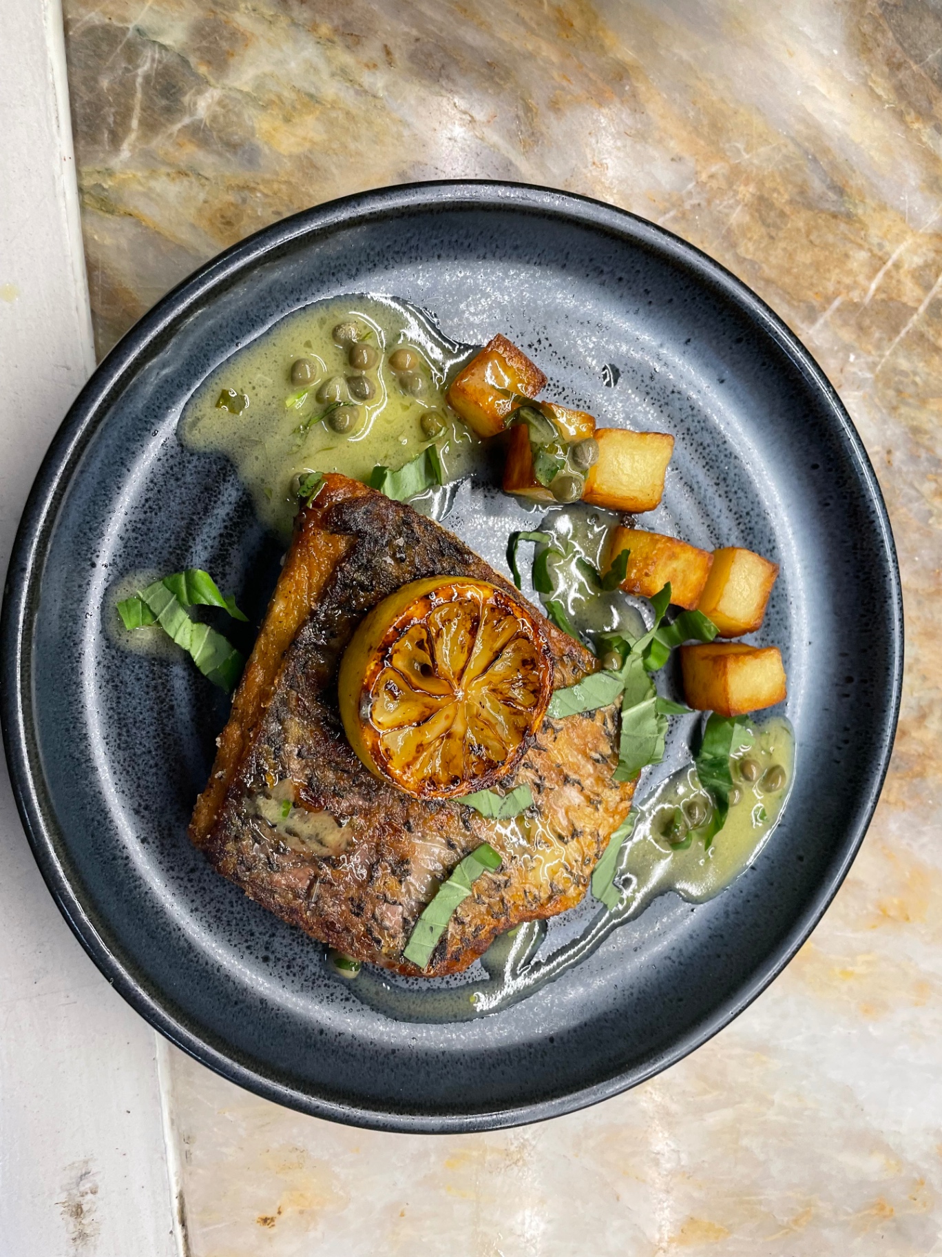 Crispy skin fish, brown butter, capers, potato