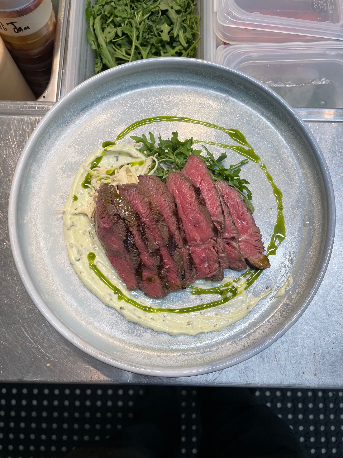 Grilled flank steak, herb crème, rocket